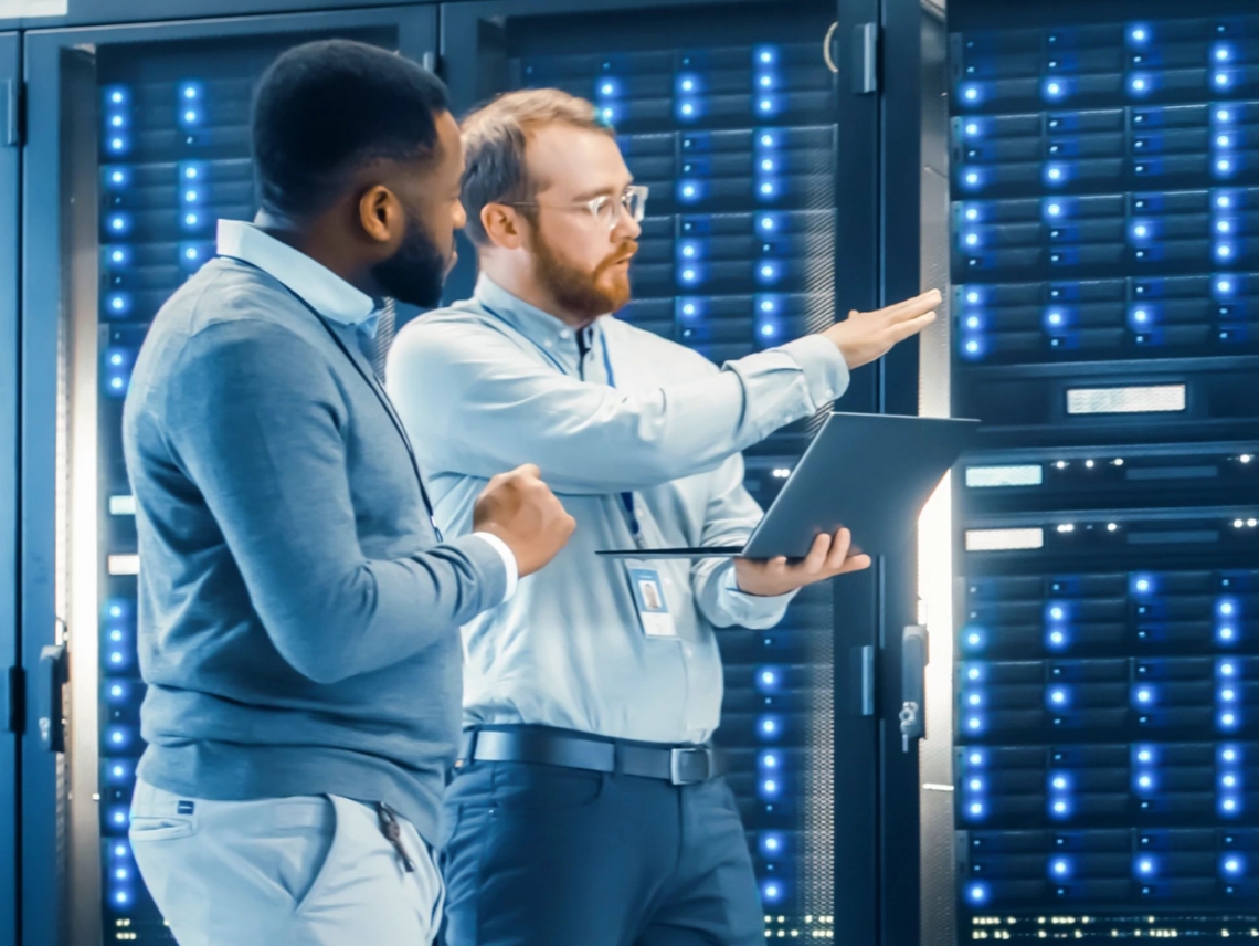 two men in a data center